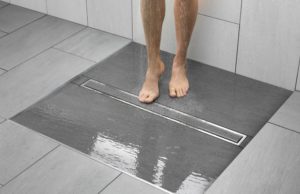 Трап с вертикальным отводом: выбор и назначение